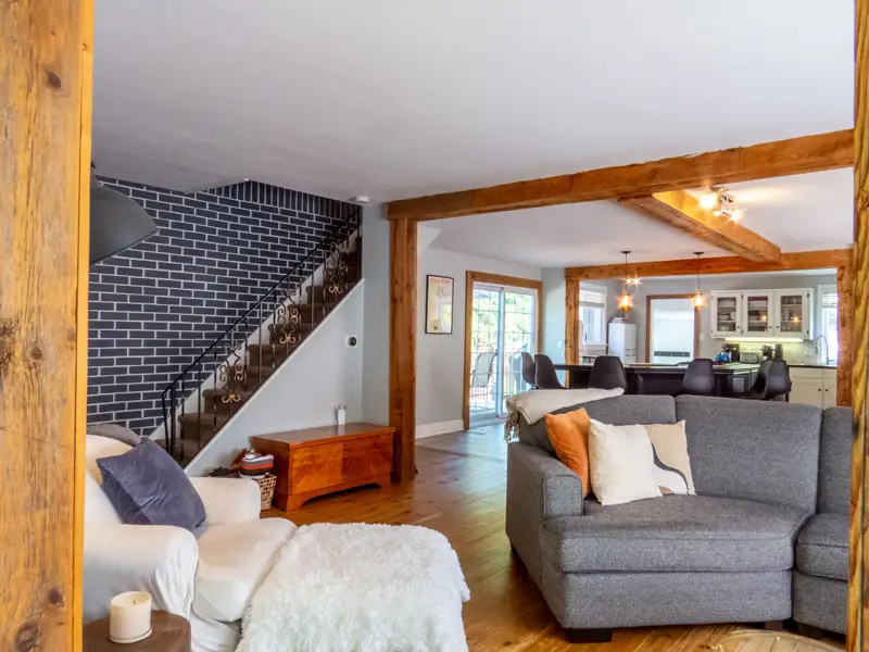 A wide angle real estate photo showcasing how large and open the room is